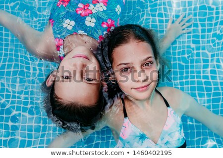 Foto stock: Little Girl Swimming Summer