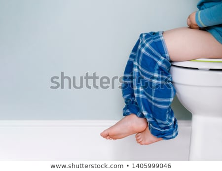 Foto stock: Child Sitting On The Potty