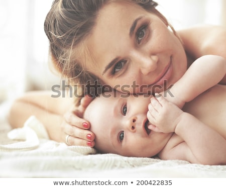 Сток-фото: Portrait Of A Beautiful Young Woman And Her Son