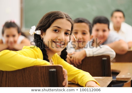 Stockfoto: A Portrait Of A Caucasian Race School Student At Classroom