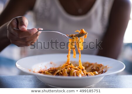 Young Woman With Spaghetti And Tomato [[stock_photo]] © dotshock