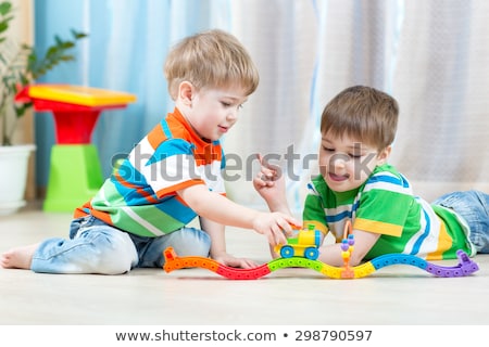 Stock photo: Two Happy Brothers Playing Toys