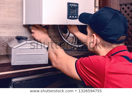 Imagine de stoc: Water Heater Maintenance