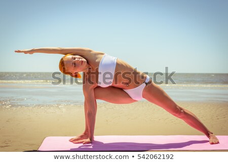 Woman Posing At Beach Photo stock © nikitabuida