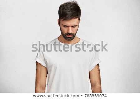 Stockfoto: Young Casual Fashion Man Looking Down