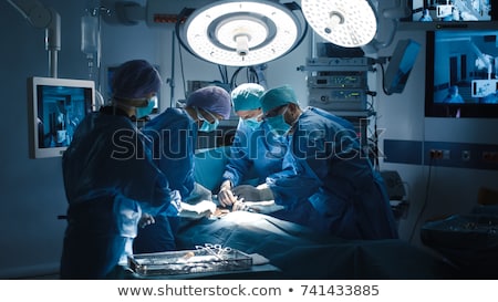 Stock fotó: Surgeons Operating In Operation Theater Room