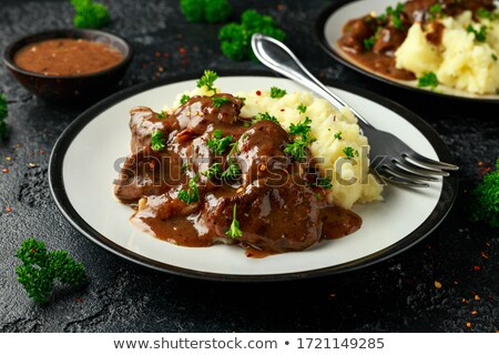 Foto stock: Pan Fried Potatoes And Chicken Liver