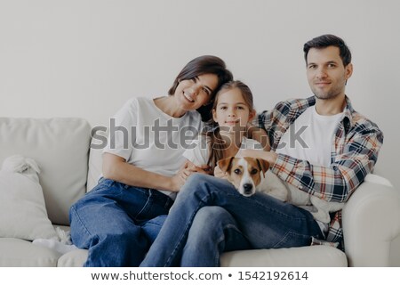 Stock fotó: Family Members Sitting In Living Room