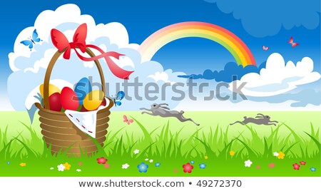 [[stock_photo]]: Colored Easter Eggs In Basket And Flowers Over Sky