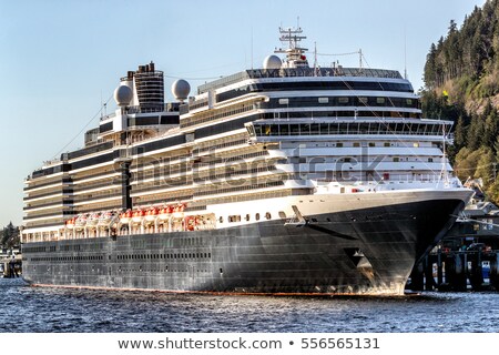 Foto stock: Vacation Travel Cruise Ship At Port Of Call Harbor Destination In Alaska Usa At Sunset