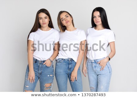 Stock photo: Lovely Girl In Blue Jeans And White Shirt 2