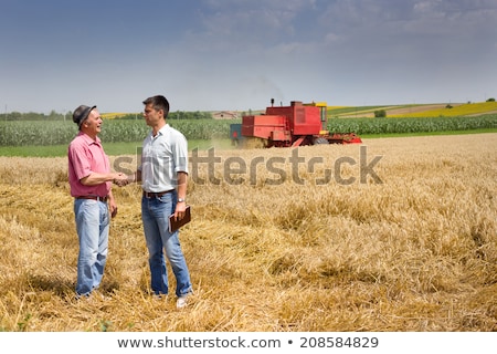 Stock photo: Plant In Hands Of Agricultural Worker