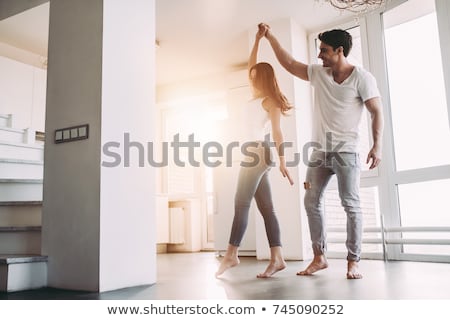 Foto d'archivio: Attractive Young Woman Dancing