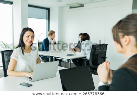 Stock foto: Businesswomen Exchanging Thoughts In A Nice Office Environment
