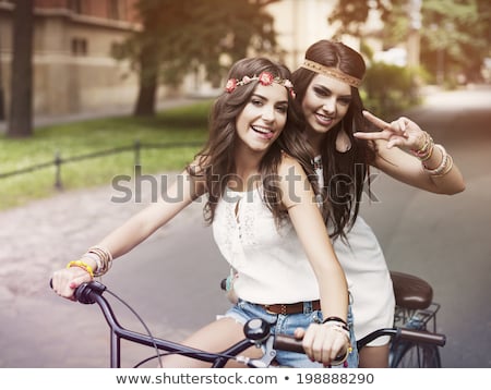 Stock fotó: Funny Portrait Of A Tandem Of Cyclists