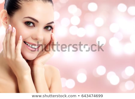 Сток-фото: Woman Smile Closeup Against An Abstract Background