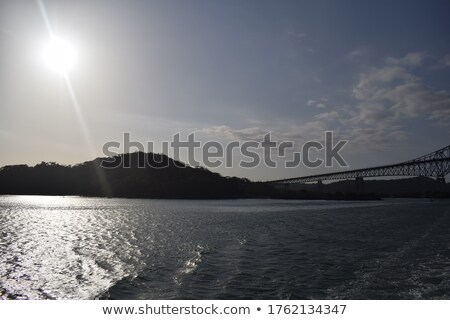 Сток-фото: Canal Of Panama With Cloudy Sky At Sunset