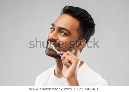 Stock fotó: Indian Man With Toothbrush Cleaning Teeth