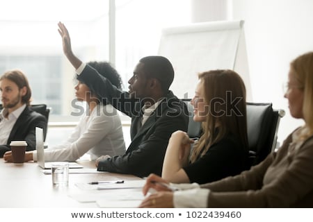 Foto stock: Businesspeople Asking Questions During Presentation