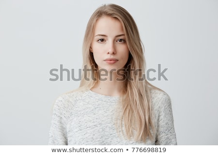 Stock photo: Thoughtful Beautiful Woman With Serious Expression