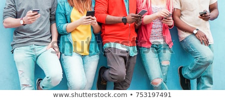 Group Of Young Men With Cell Phones Foto stock © DisobeyArt