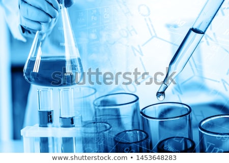 ストックフォト: Chemist With Test Tubes And Flask