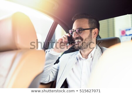 Stok fotoğraf: Seated Mature Successful Man In Leather