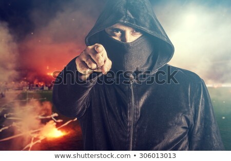 [[stock_photo]]: Unrecognizable Hooded Soccer Hooligan Portrait