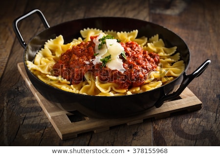 Stok fotoğraf: Pasta Farfalle With Tomato Sauce And Cheese