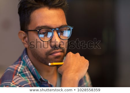 ストックフォト: Close Up Of Creative Man Working At Night Office