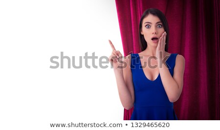 Stock fotó: Pretty Woman In Front Of Red Curtains Indicates Something About The Theater Show Isolated On White