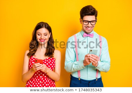 Stock fotó: Photo Of Lovely Woman Wearing Red Dress Smiling And Holding Cell