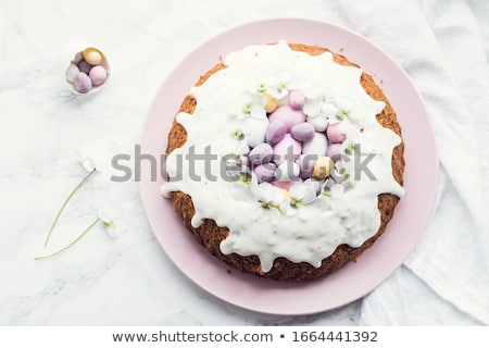 [[stock_photo]]: Traditional Easter Cake With Colored Eggs And Flowers Marble Background