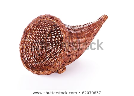 Foto stock: Brown Wicker Empty Cornucopia Basket