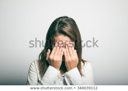 Stok fotoğraf: Young Woman Covers Eyes Of Mature Woman