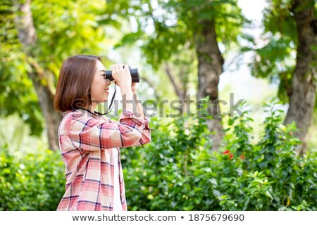 Сток-фото: A Woman In Nature Or In A Public Park Alone On A Walk