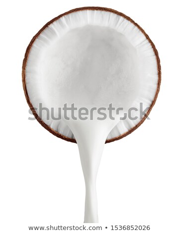 Foto d'archivio: Coconut Milk On White Background