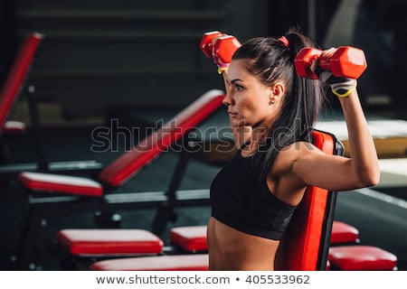 Stock fotó: Female Doing Shoulder Press