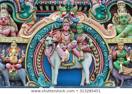 [[stock_photo]]: Ornate Hindu God And Goddess Temple Stone Sculptures