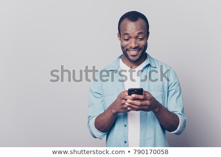 Сток-фото: Surprised Man Watching His Cellphone