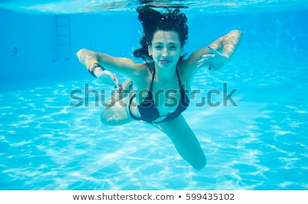 Foto d'archivio: Underwater Close Up Portrait Of A Woman