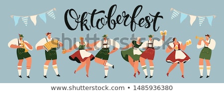 Foto stock: Woman Waitress In Oktoberfest Concept