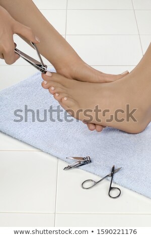 Stockfoto: Side View Of A Young Woman Receiving Pedicure Treatment