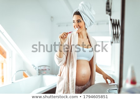 Stock photo: Pregnant Women In Bathroom