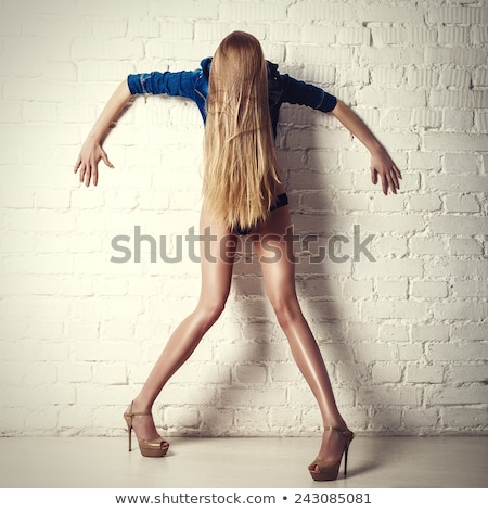 Stock photo: Urban Girl In Studio Posing With Attitude