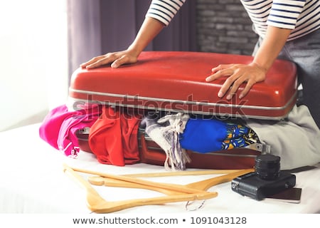 Travel And Vacation Concept Happiness Woman Packing Stuff And A Stock foto © Freedomz