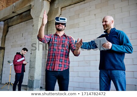 Stock foto: Engineer Making Fun Of His Colleague