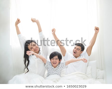 Foto stock: Mother Rising Up Boy