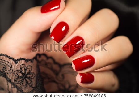Foto stock: Woman With Beautiful Manicured Red Fingernails