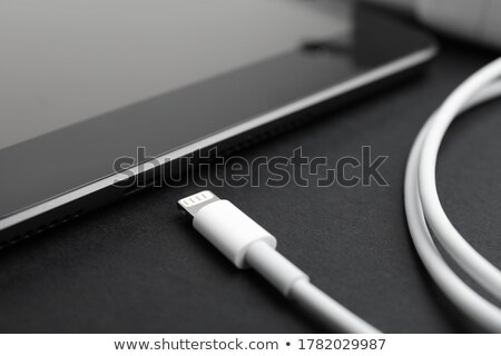 Stock photo: Black Tablet Charged Usb